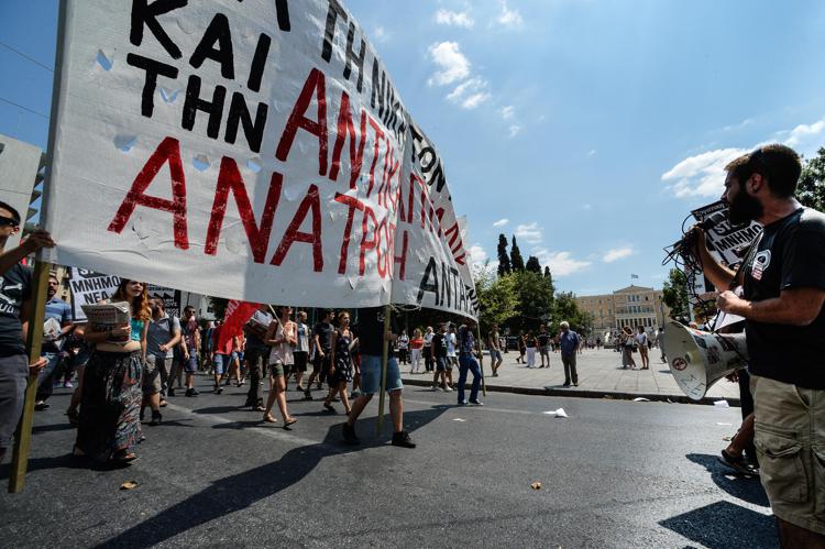 Una manifestazione di protesta nel centro di Atene(Foto Afp)