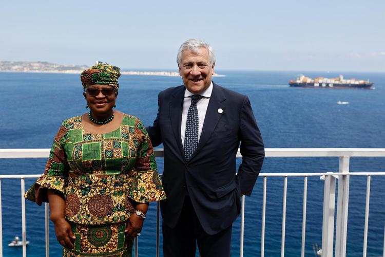 World Trade Organisation chief Ngozi Okonjo-Iweala (L) with Italy's foreign minister Antonio Tajani (R)