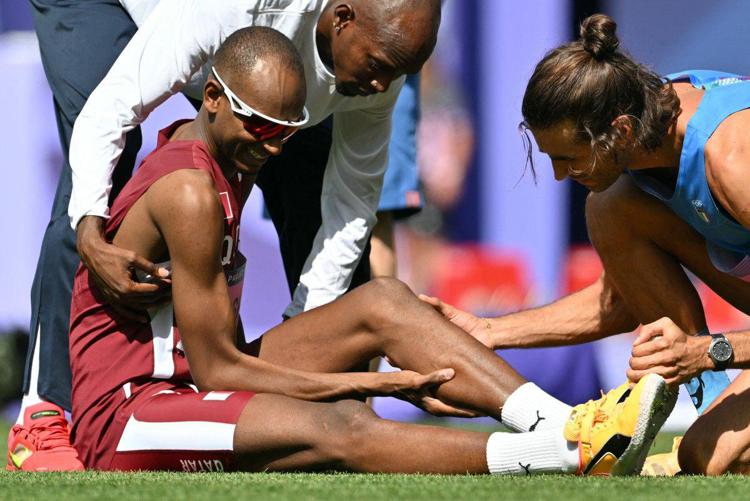 Tamberi soccorre Barshim (Afp)