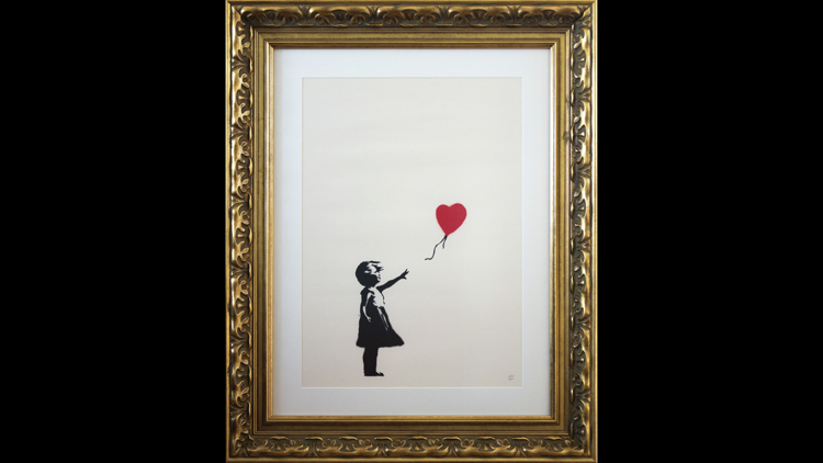 Girl with Balloon di Banksy 