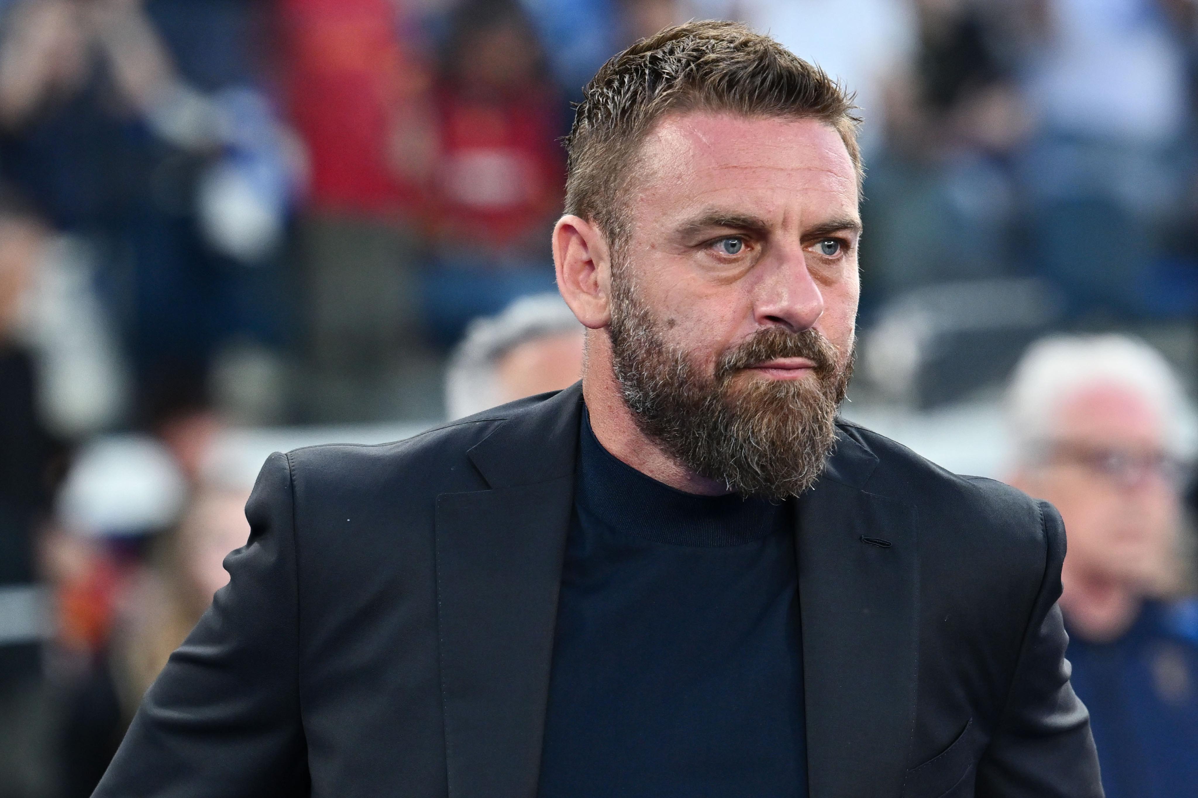 Roma fires De Rossi, Lazio fans rejoice and strike