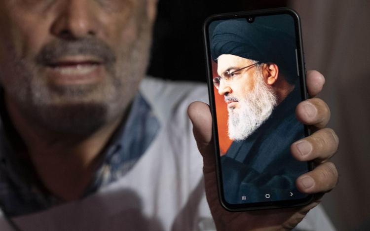 Proteste in Iran dopo il raid di Israele su Beirut e il ritratto del leader di Hazbollah, Hassan Nasrallah - Fotogramma /Ipa