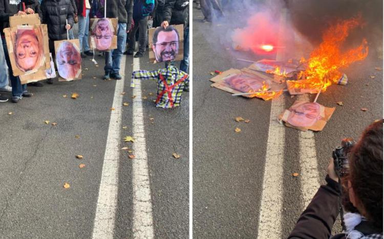 Le foto bruciate al corteo - Adnkronos